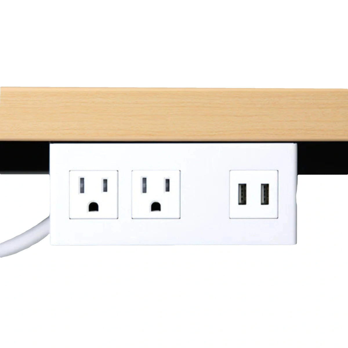 a white dual electrical outlet and a USB port installed under a light-colored wooden desk for easy access to power and USB charging options