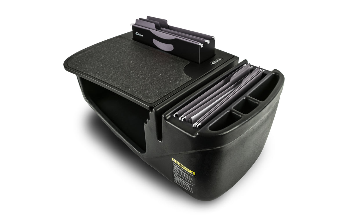 a desk is made of black plastic with a flat, sturdy work surface on top. It features a black hanging file holder on the front side and is designed to sit securely on a car’s passenger seat. This setup allows for easy access to files and provides a writing surface while on the go