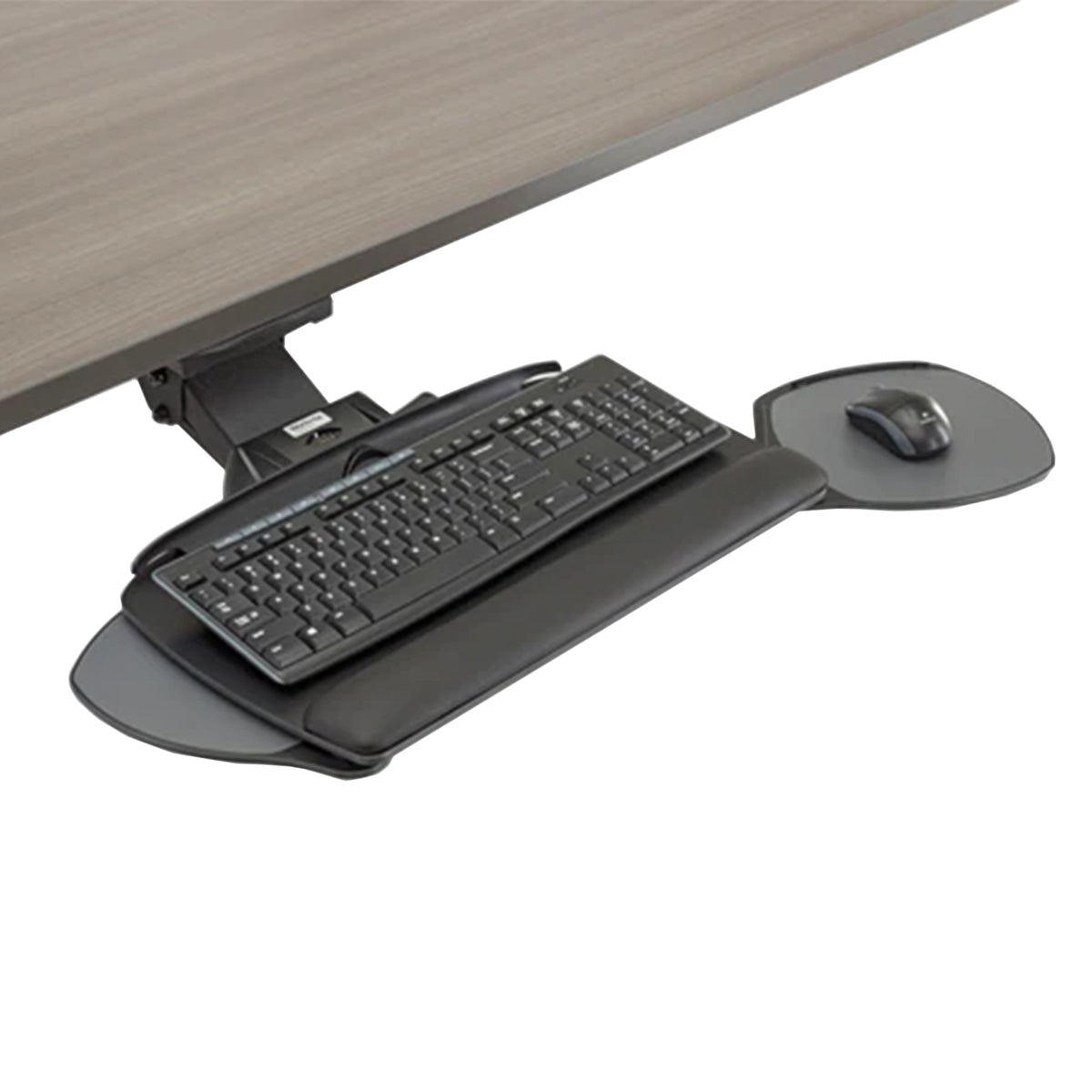 A black ergonomic desk keyboard tray with integrated wrist rest and mouse pads, shown under a wood-grain desk on a white background. Has a keyboard and mouse on it