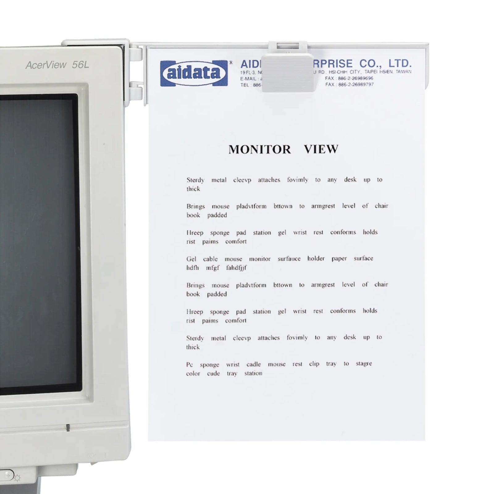 Copy Clip with Adhesive Mount connected to a computer for convenience.