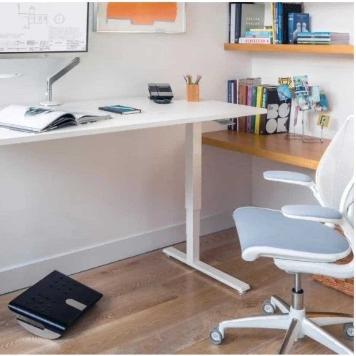 Black Ergonomic Foot Rocker Foot Rest under a desk
