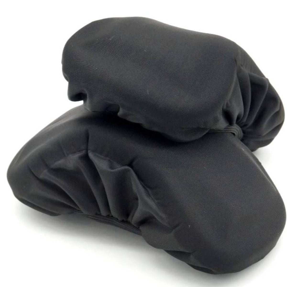 A pair of black stretchable memory foam arm covers for office chairs. The arm covers made of a soft, flexible material and have visible creases and folds, indicating their adaptability to fit various armrest shapes and sizes. The image is set against a plain light-colored background