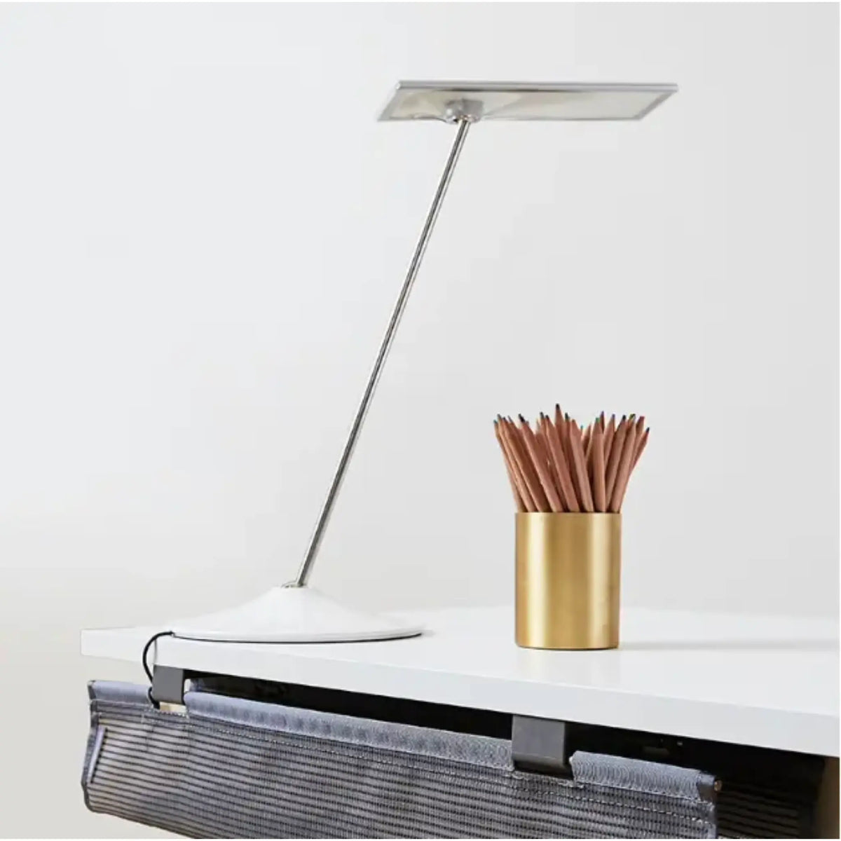 Below view of the Horizon 2.0 Adjustable LED Desk Lamp with the cable in a cable manager.