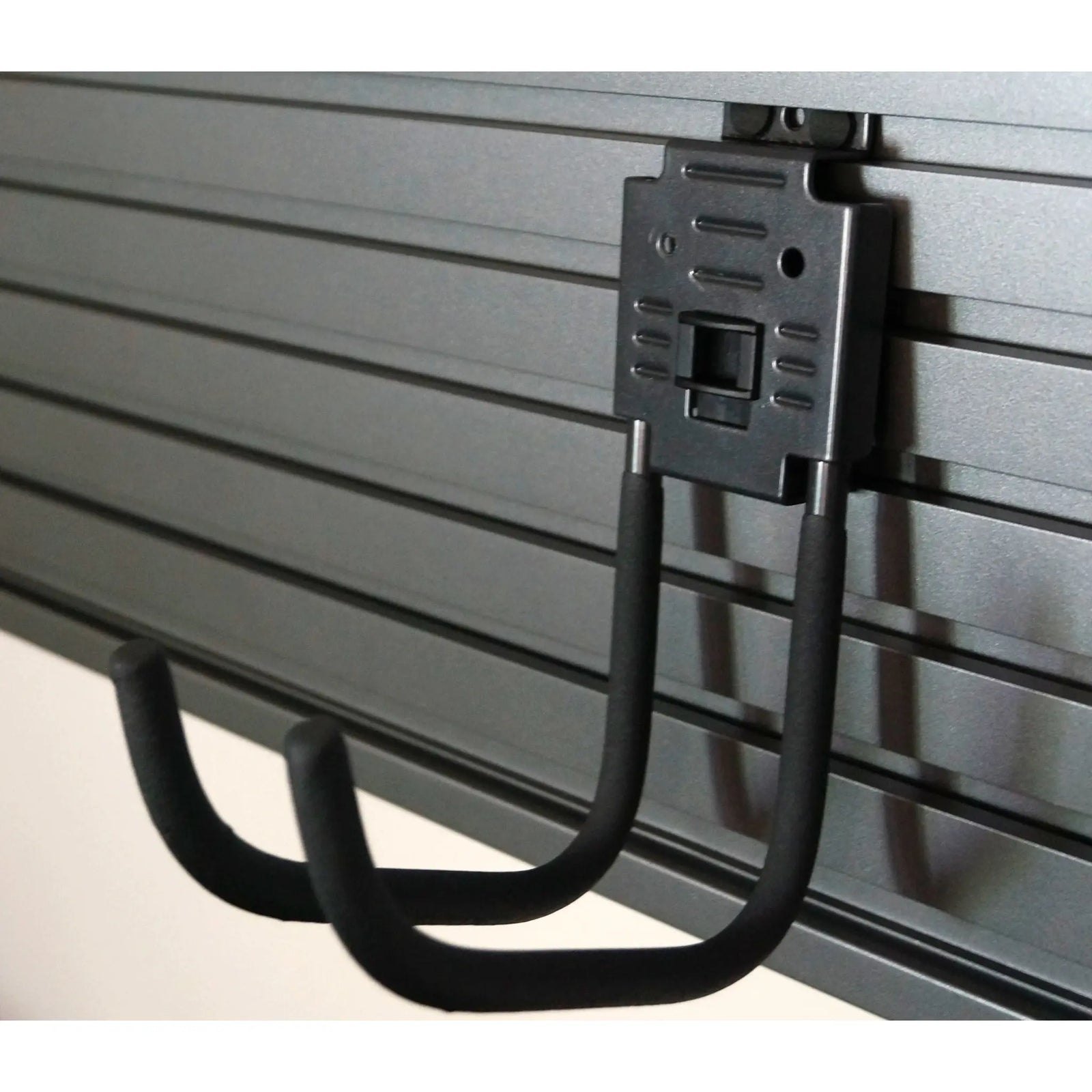 J Hook attached to a slatwall ideal for mobile office setups to reduce extra clutter.