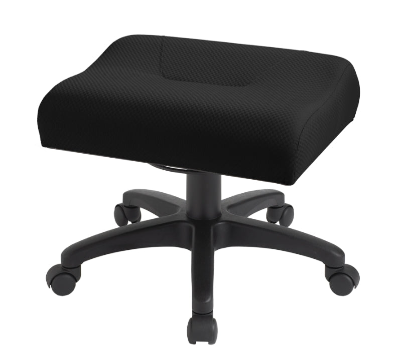 A black ergonomic foot rest with a contoured, cushioned surface and a five-point rolling base, featuring a pneumatic height adjustment lever on the right side