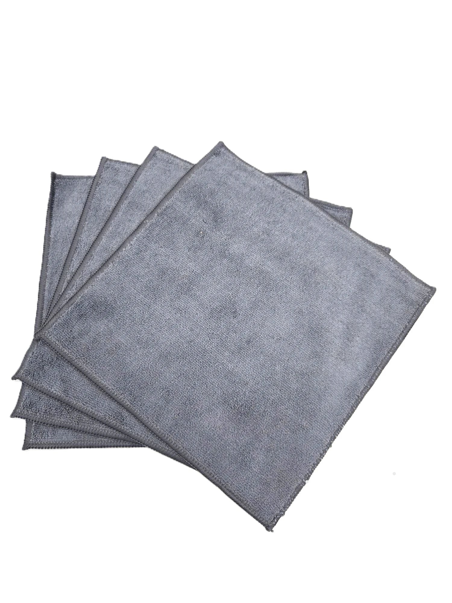 Four square, gray, microfiber clothes with gray stitched borders stacked on top of each other and spread out 