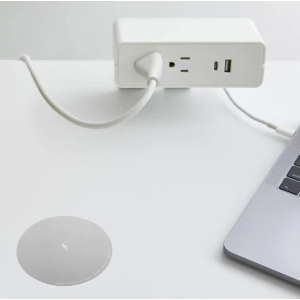 White NeatHub Power Station  with multiple outlets in use.