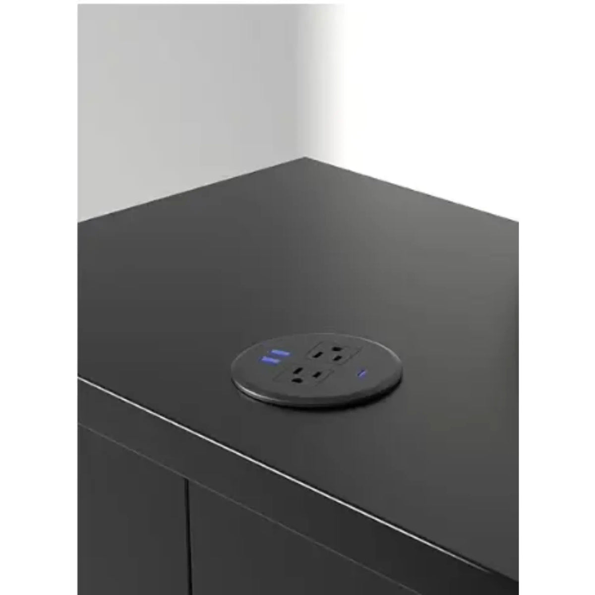 The fast Power Grommet easily sliding into a desk for maximization of space.