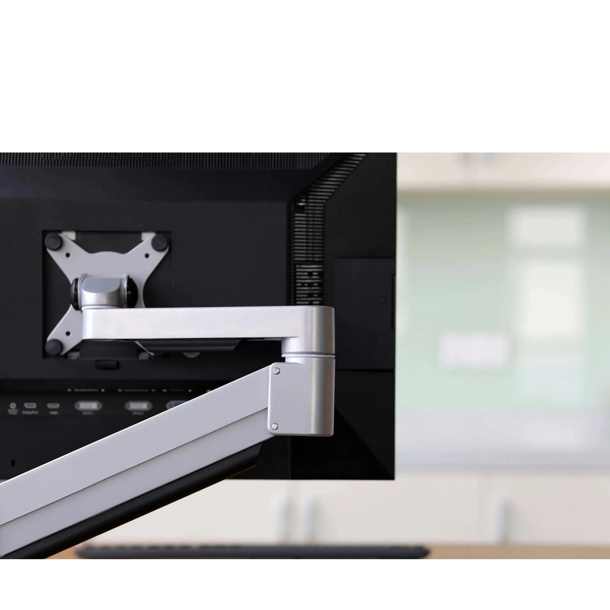Monitor arm adjusted to user&#39;s preference 
