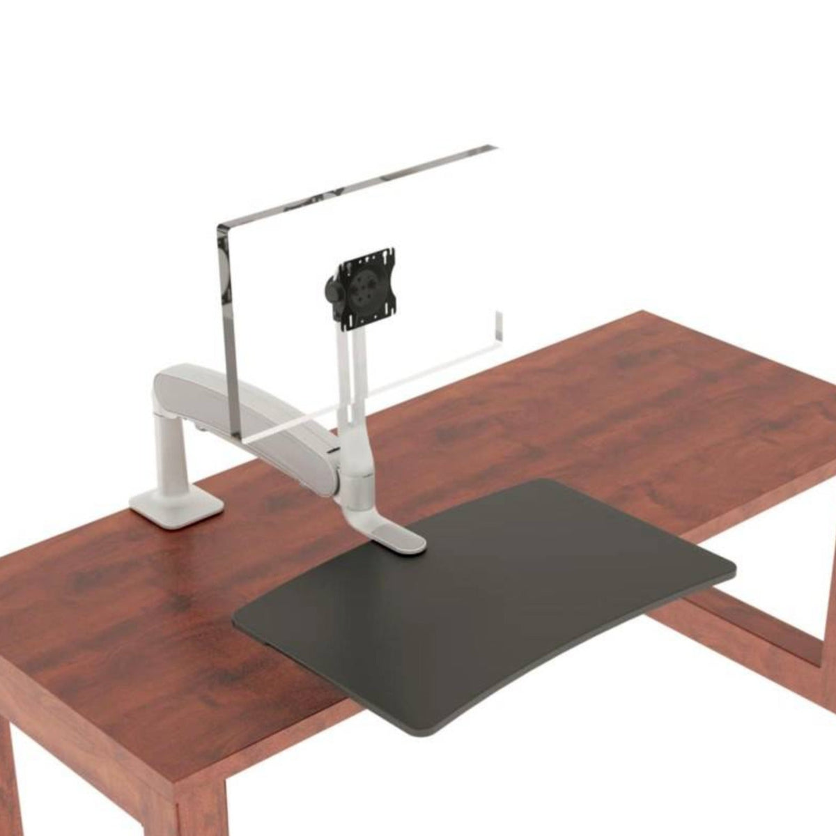 An ergonomic Solace Single monitor arm with a keyboard platform attached is mounted on a wooden desk. The setup includes a transparent monitor mount and a large, rectangular black mouse pad on the desk surface