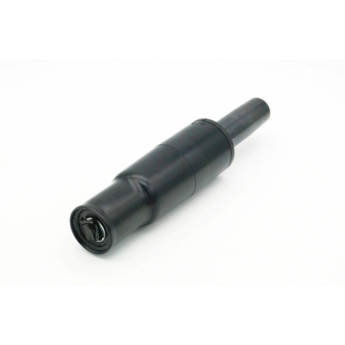 Black cylindrical object on a white background