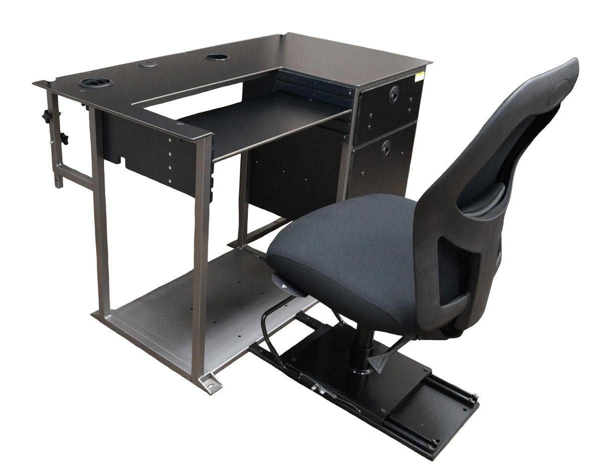 a right-angled view of a small black desk with a connected black chair mounted on a black sliding seat base. It has silver metal frame and a set of drawers located on the right side. The work surface features two empty grommet holes located at the top and a dropped down keyboard tray in the center. The back of the desk has a connected metal pole for the optional mounting of a slatwall hutch. The bottom of the desk is connected with a large sheet of gray metal. 