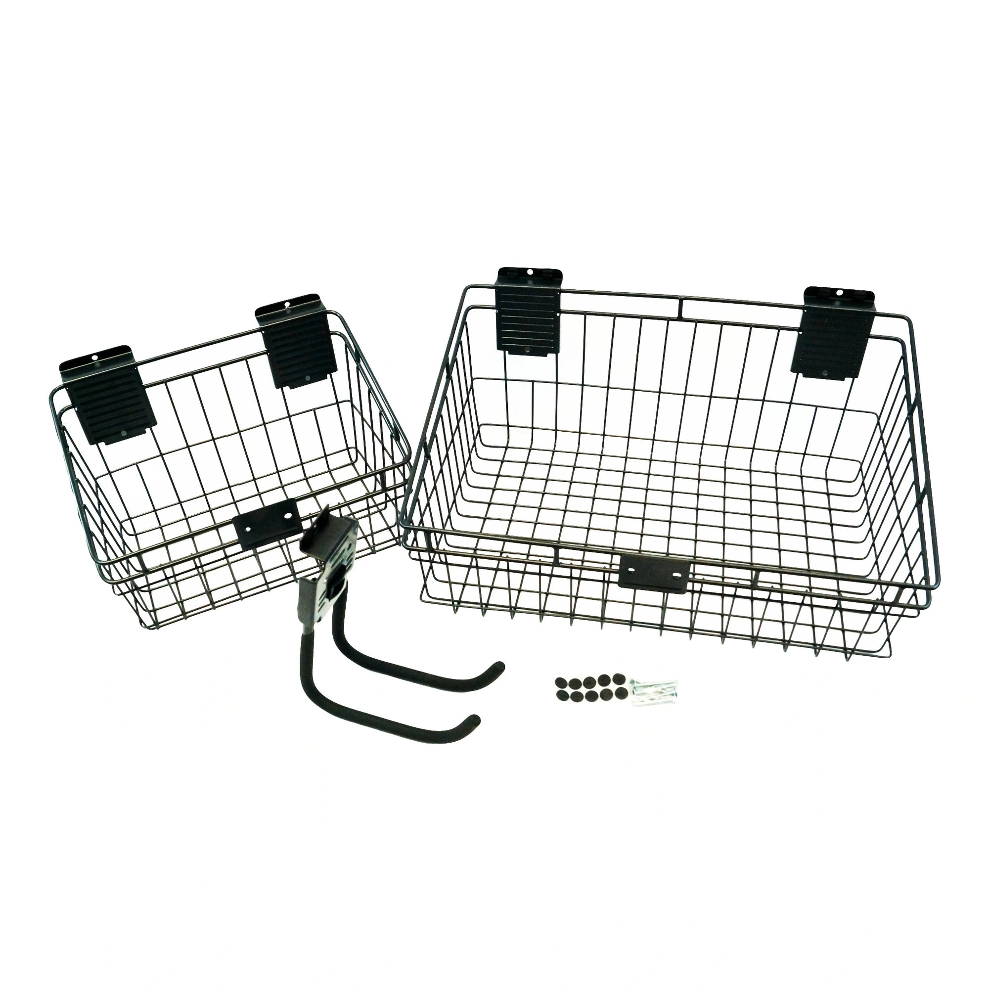 two black metal baskets, a medium (left) and a large (right) with a rectangular shape and a depth to hold several items, the back of the baskets have two wall hooks with a screw hole. Overlapping the medium basket (left) is a J shaped hook featuring a rectangular metal piece with ridged pieces of metal on the sides and top for placement on a slatwall hutch. Below the large basket (right) there’s a small clear plastic pack containing screws and anti-slip stickers for mounting.