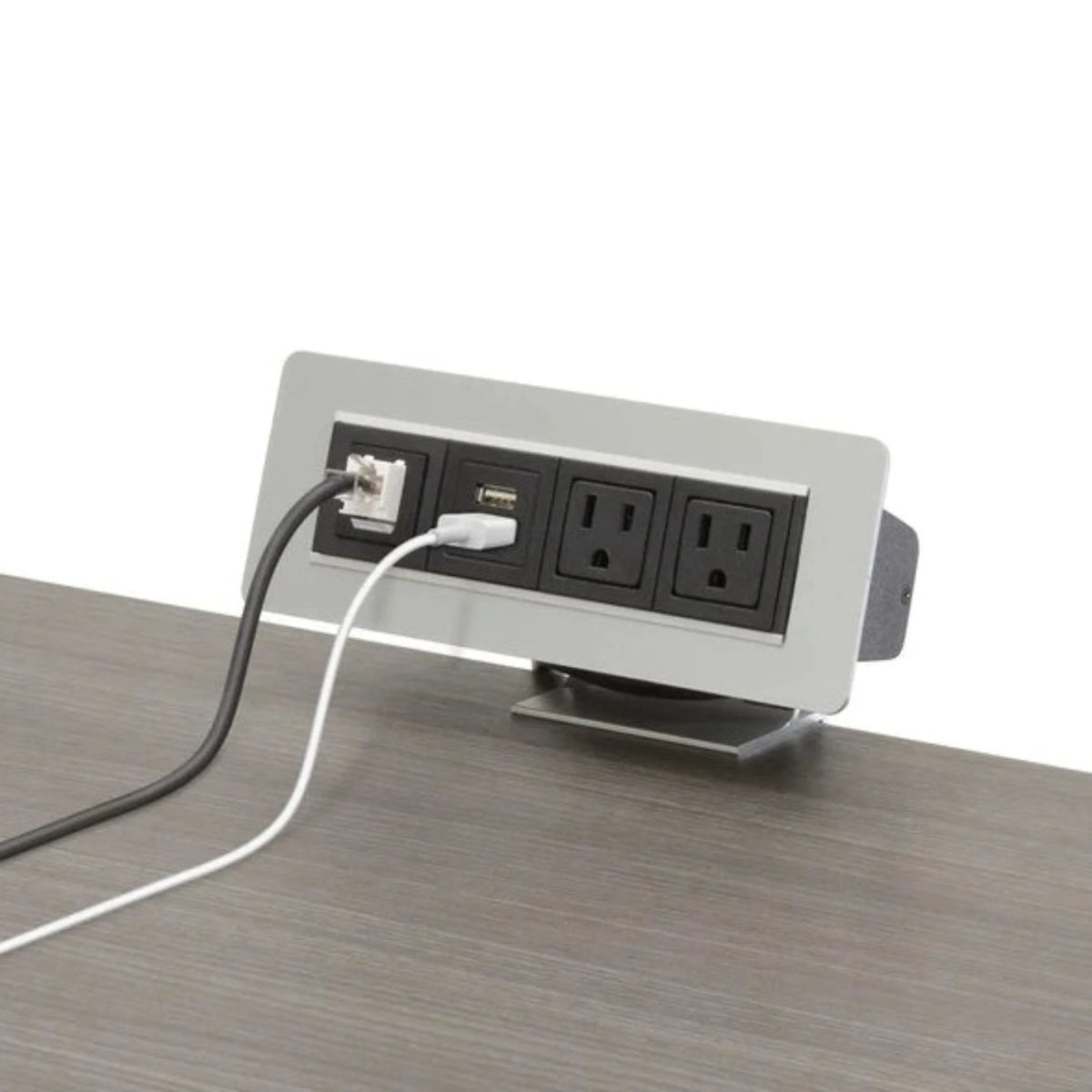 A pop-up outlet installed on a grey desk surface featuring two electrical sockets and one Ethernet port, with an Ethernet cable already plugged in. This setup is typically used in office environments for convenient access to power and network connections