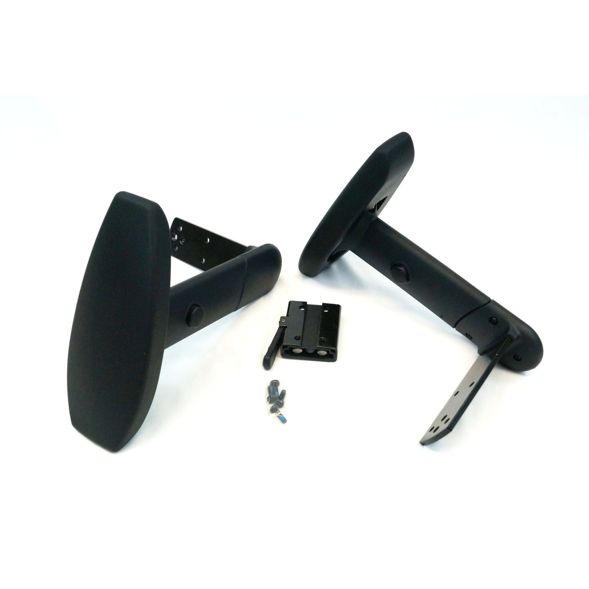 Two black, plastic armrests lying on a white surface. The armrests are positioned with the larger, rounded parts facing upwards and the attachment points with screw holes visible. Also present are two metal brackets and four screws placed between the armrests. These components are used in the installation or replacement of the armrests. 